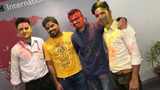 BBC reporters covered in paint