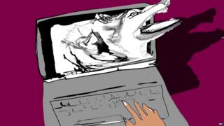 Laptop with a wolf coming out of screen