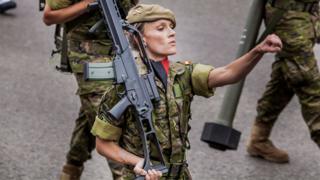 Technology Woman soldier marching in Madrid, 12 Oct 18