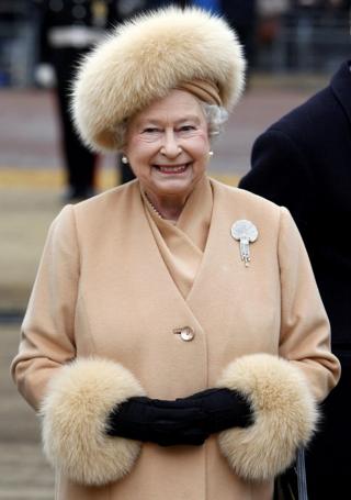 24/02/09 of Queen Elizabeth II in a fur coat, as she no longer uses fur in her outfits, having switched to fake fur this year,