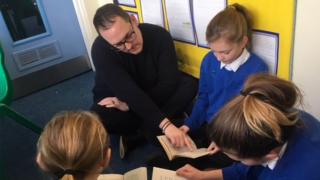 Teacher with pupils