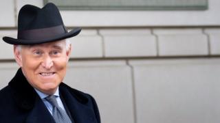 Roger Stone leaves his sentencing hearing in February