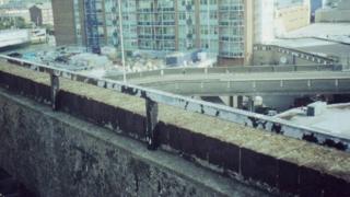 At the time of Innes's death there was only a small railing on the 8th floor wall