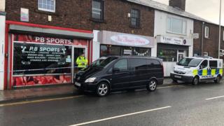 Carlisle bodybuilding shop fire: Man remanded - BBC News