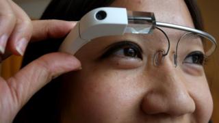 woman demonstrates Google Glass