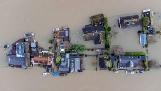 Aerial birds-eye view shows flooded houses in Henley-on-Thames on 5 January