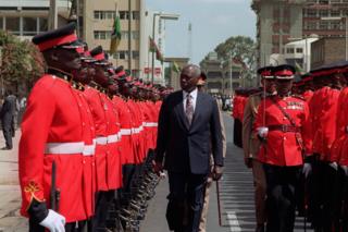 Daniel arap Moi shown inspects the honour guard at the opening of Parliament in Nairobi in 1992.