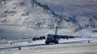 Plane at mountain airstrip Daulat Beg Oldi