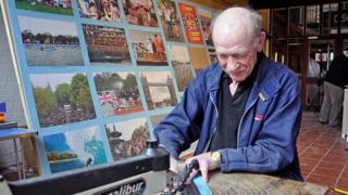 David Evans cutting jigsaw pieces