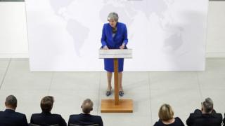 Theresa May speaking in London