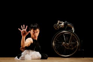 Kenta Kambara, who was born with spina bifida, performs onstage during a dance event in Tokyo, Japan. 8 February 2020.
