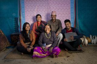 Salina, 21 (left), pictured with her grandmother Batuli Maya Nagarkoti, 72 (centre) and brother Arun Kumar Nagarokoti, 18 (right) and parents (back, left to right) Bimala Nagarkoti, 42 and Aanand Kumar Nagarkoti, 45