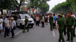 Police halt protests against a new economic zone law in Vietnam June 2018
