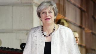 Theresa May arrives for The Sun Military Awards at Banqueting House in London.