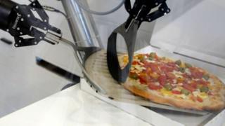 A robot pizza maker