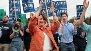 Senator Amy Klobuchar marches into the Polk County Steak Fry