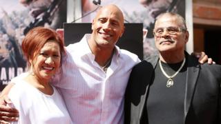 Rocky Johnson (R) with his son Dwayne "The Rock" Johnson (C) and ex-wife Ata Johnson (L)