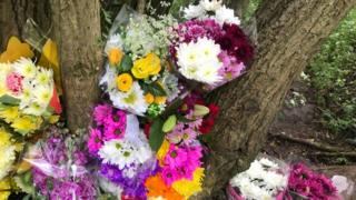 Floral tributes left at the scene