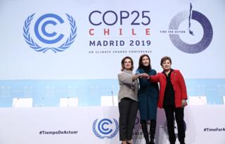 From left, Spain's minister for the ecological transition, Teresa Ribera, COP President Carolina Schmidt and UN climate chief Patricia Espinosa