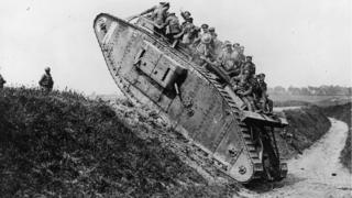 Soldiers on a tank during World War One.