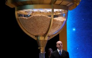 Lottery balls are collected before the start of Spain"s Christmas lottery "El Gordo" (The Fat One) in Madrid