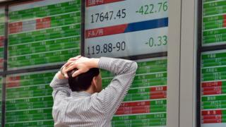 Man watching Japanese stocks