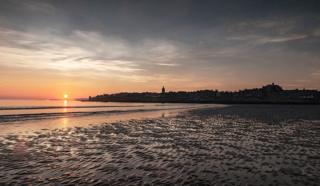 Sun rise over West Sands, St Andrews