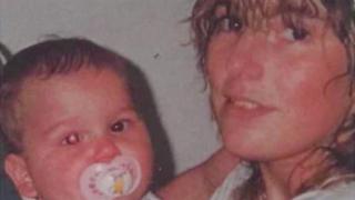 Marco Hauenstein as a baby, with his birth mother
