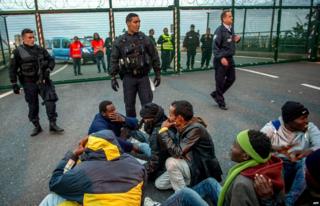 Migrants outside the Eurotunnel gates