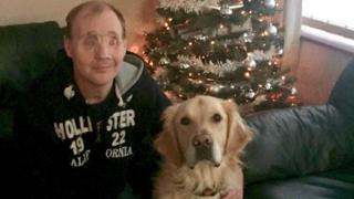 Andrew Foster with guide dog Nevis