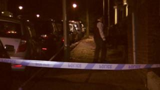 Police tape in road