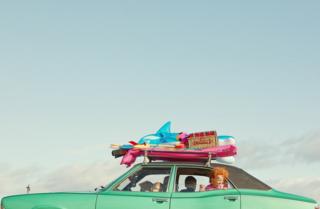 Portrait of a family in a car