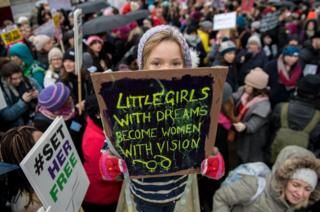 Orla Dean, 5, holds a placard during the Time's Up rally at Richmond Terrace, opposite Downing Street on 21 January 2018 in London, England.