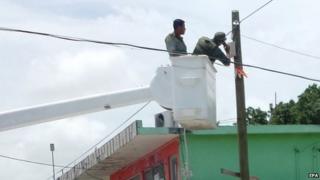 Mexican soldiers remove illegal security cameras placed by organised crime groups in Reynosa on 22 May 2015