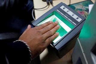 A woman goes through the process of finger scanning for the Unique Identification (UID) database system, also known as Aadhaar, at a registration centre in New Delhi, India, January 17, 2018.