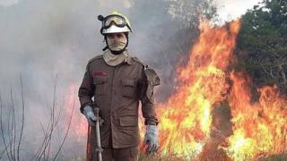 Firefighters trying to extinguish a fire in the Amazon rainforest, in Rio Branco, Acre State, 24 August 2019
