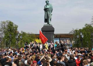 Demonstration at base of statue of Alexander Pushkin on Pushkin Square, Moscow