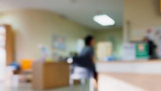 Blurry picture of woman in waiting room