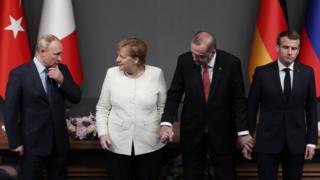 ميركل وبوتين وأردوغان وماكرون