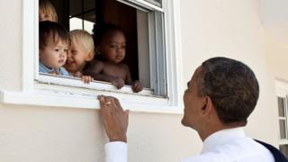 President Obama smiles at children in Maryland