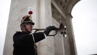 original armistice bugle is played under the Arc de Triomphe.