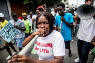 A protester in Haiti