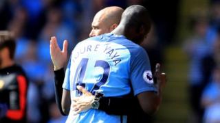 Yaya Toure and Pep Guardiola