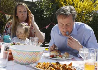 David Cameron has a bite to eat