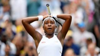 Cori Gauff of the US celebrates winning her first round match against Venus Williams at Wimbledon