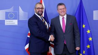 European Commission Vice President Maros Sefcovic shakes hands with British Foreign Secretary James Cleverly in Brussels, Belgium, February 17, 2023. REUTERS/Johanna Geron