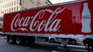 A Coca-Cola truck makes its way through downtown Los Angeles, California