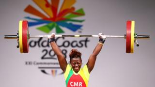 Arcangeline Fouodji Sonkbou of Cameroon competes during the Women's 69kg final of Weightlifting on day four of the Gold Coast 2018 Commonwealth Games, Australia, April 8, 2018