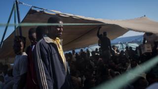 Migrants on board the Migrant Offshore Aid Station (MOAS) Phoenix vessel en route to Italy, 11 June 2017