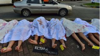 in_pictures Women perform in memory of women killed in Panama, during the International Day for the Elimination of Violence against Women, in Panama City, on 25 November, 2019.